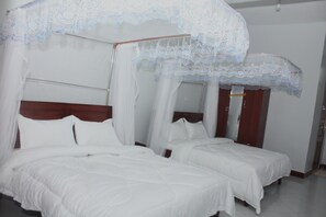 غرفة مريحة مزدوجة أو بسريرين منفصلين - منظر للحديقة | واي فاي مجانًا وملاءات أسرّة