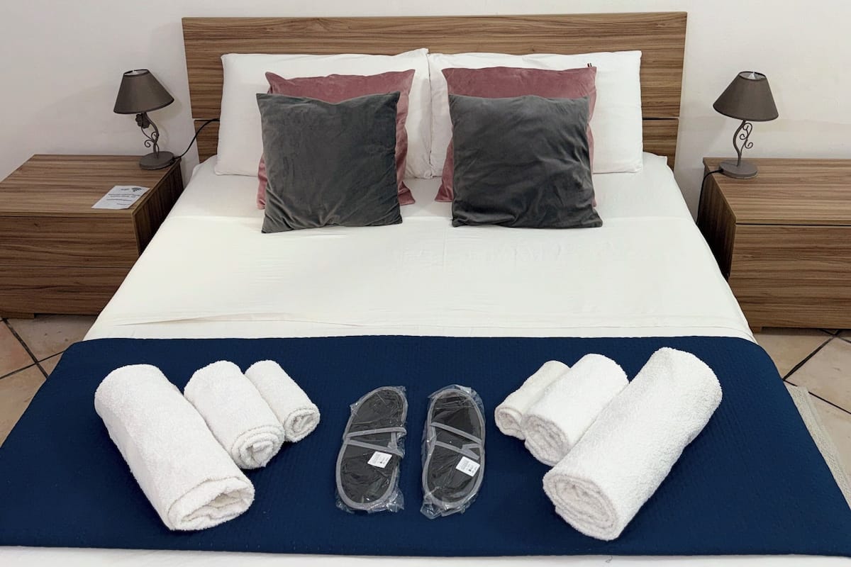 Comfort Triple Room, Courtyard View | In-room safe, soundproofing, iron/ironing board, free WiFi
