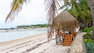 On the beach, white sand