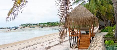 On the beach, white sand