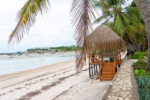 On the beach, white sand