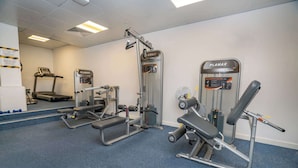 A gym with various exercise equipment including treadmills, weight machines, and a bench press. - 2 Budget En-Suite Rooms with Shared Kitchen (Coventry)