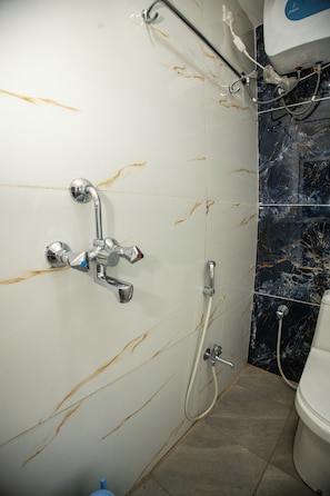 Triple Room, City View | Bathroom | Shower, towels, soap - Sri Residency (Ujjain)