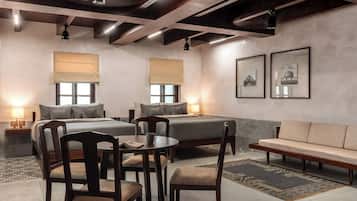Deluxe Suite, Balcony, City View | Minibar, in-room safe, blackout curtains, iron/ironing board