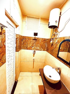 Dusch och gratis toalettartiklar