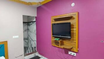 Departamento Deluxe, aire acondicionado | Escritorio, espacio para trabajar con laptop, camas extra y wifi gratis