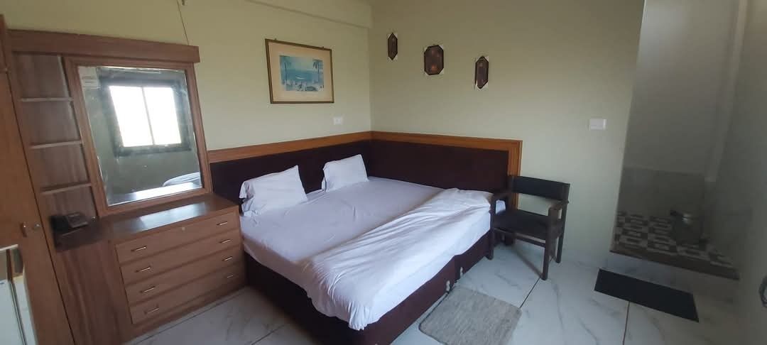 Desk, laptop workspace, rollaway beds, free WiFi