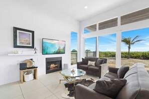 TV, offices - Beachfront Haven – Steps from Downtown & the Sand (Cocoa Beach)