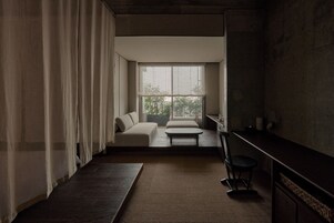 Quarto duplo superluxo, sacada, vista para a montanha | Área de estar