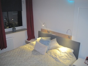 Iron/ironing board, travel crib, WiFi, bed sheets