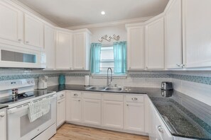 Fridge, microwave, oven, stovetop - Pet-Friendly Coastal Retreat | Private Patio & Comfort (Corpus Christi)