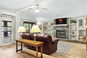 TV, fireplace - Serene Wimberley Escape with River Access, Kayaks & Fire Pit (Wimberley)