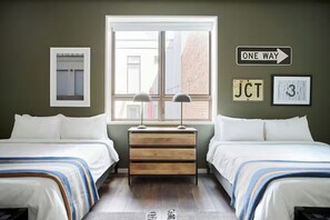 Desk, laptop workspace, blackout curtains, free cots/infant beds