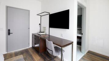 Desk, laptop workspace, blackout curtains, free cots/infant beds