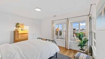 2 bedrooms, desk, iron/ironing board, travel crib