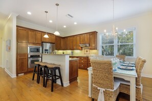 Fridge, stovetop, dishwasher, coffee/tea maker - Fairwinds Family Getaway with Pool & Hot Tub - by Island Real Estate Vactions (Holmes Beach)