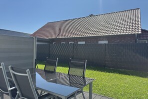 Outdoor dining - Moderne Ferienwohnung mit Sauna & Terrasse (Burhave)