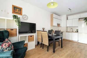 TV, offices - Cozy Apartment in the Center of Poznan | Balcony (Poznań)