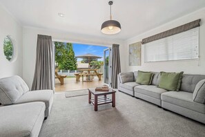 TV, fireplace - Tihi Time - Great Deck, Spa Pool & Games Room (Rotorua)