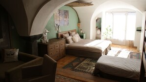A bedroom with a large bed, a dresser, a chair, and a window with a view. - AU COCON SAVOIE☃️❄️ Cosy valley accommodation for the clever😃⛷️🏂🏻 (La Plagne Tarentaise)