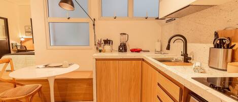 Coffee/tea maker, fridge, microwave, oven