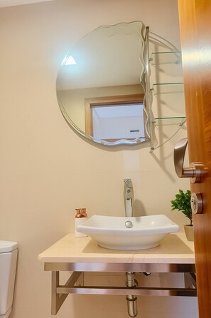 Hair dryer, towels, soap, toilet paper