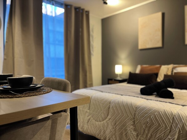 Departamento clásico, vista a la ciudad | Cortinas blackout, tabla de planchar con plancha y wifi gratis