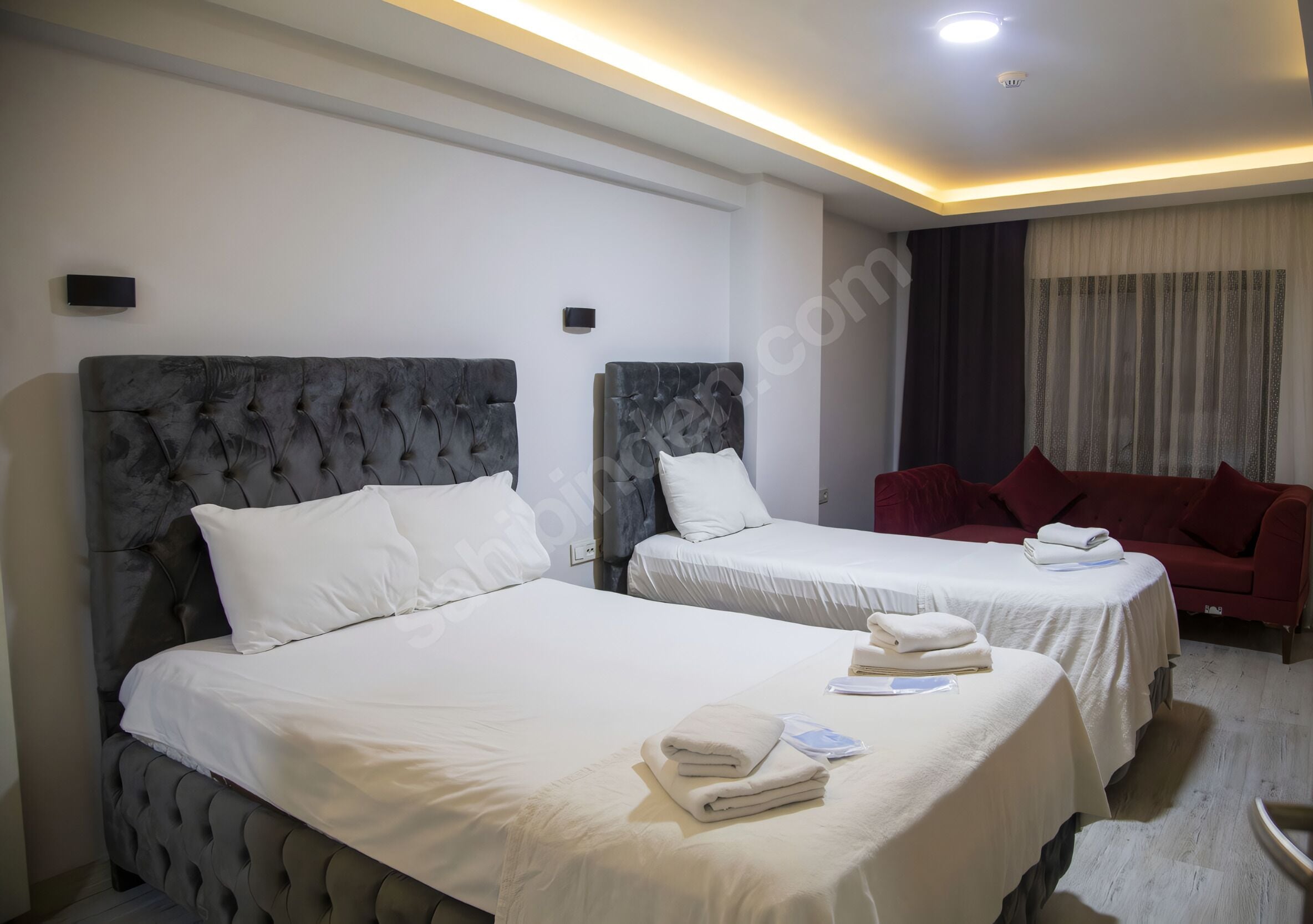 Family Suite | Living area | 120-inch Smart TV with satellite channels, video-game console, Netflix