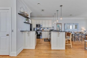 Fridge, microwave, oven, stovetop - Hightide Oasis is a bright, coastal getaway short walk to the beach. (Carolina Beach)