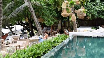 Outdoor pool, pool umbrellas, sun loungers