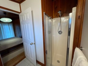 Shower, eco-friendly toiletries, hair dryer, towels