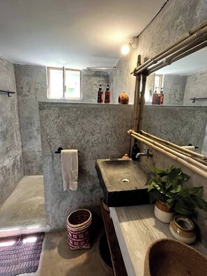 Shower, towels, soap, toilet paper