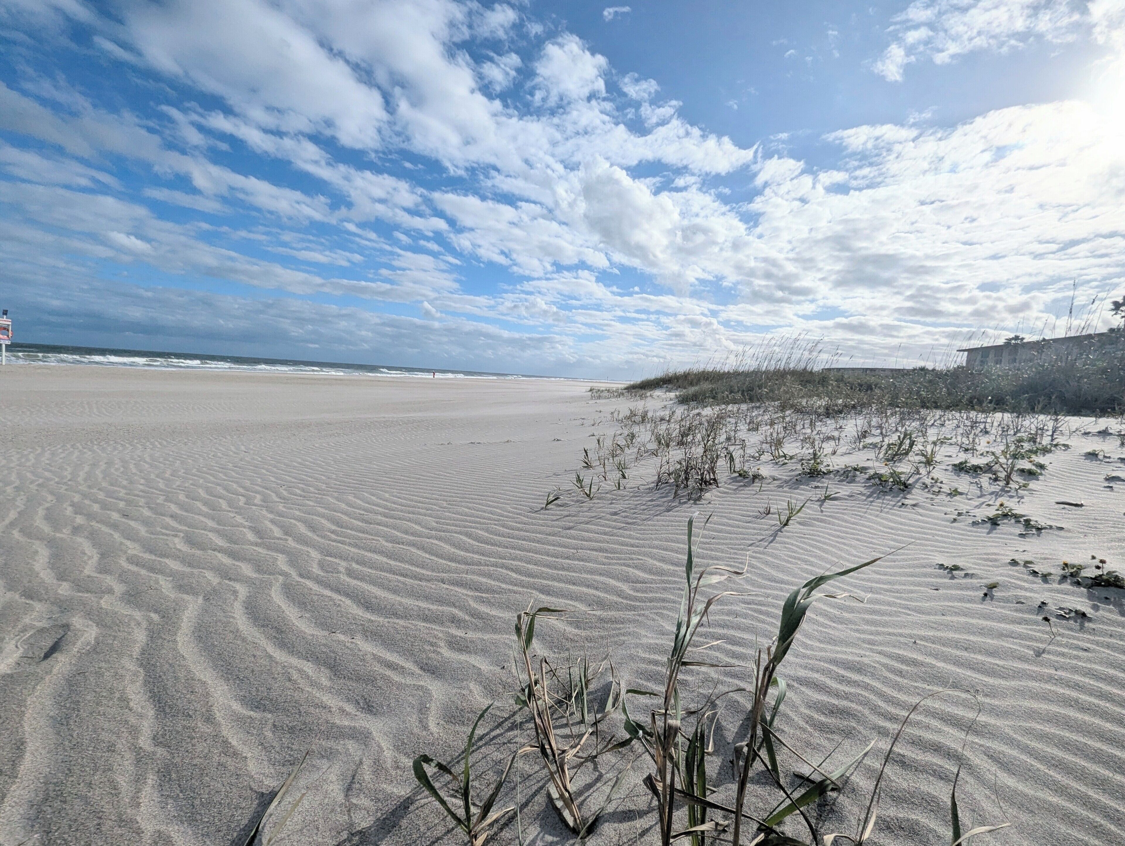 On the beach, sun-loungers, beach towels