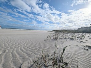 On the beach, sun-loungers, beach towels