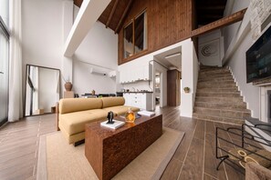 Superior Villa, Lake View | Living area | 55-inch Smart TV with digital channels