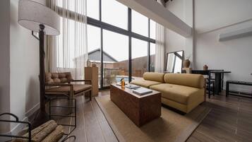 Superior Villa, Lake View | Living area | 55-inch Smart TV with digital channels