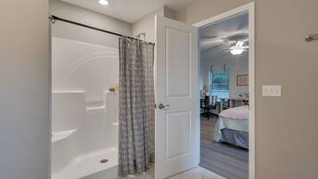 Shower, hair dryer, towels, toilet paper