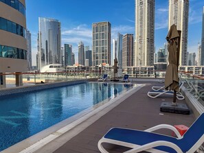 Outdoor pool - PVH - Canal Frontage 1BR - Millennium (Dubai)