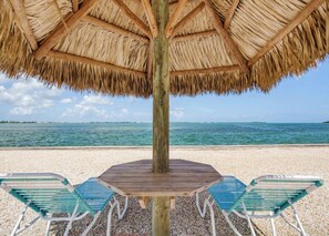 Outdoor dining - Waterfront 2BR Home w/ Dock + Golf Cart, Open Water Views in Venture Out (Cudjoe Key)