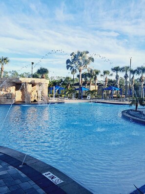 Outdoor pool, a heated pool - Spacious 3 BD, 3 BA ,townhome in lovely Kissimmee with AC, 12 minutes Disney. (Kissimmee)