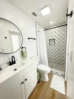 Shower, hair dryer, towels, soap - Steps to the Beach! Modern 2BR/2BA Retreat — Family-Friendly & Fully Equipped (Fort Myers Beach)