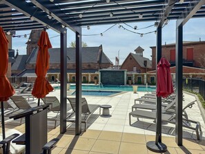 Outdoor pool - 30% off Newark Haven: Sky Lounge + Game Room Near NYC, MetLife Stadium (Newark)