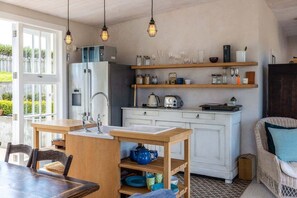 Fridge, stovetop, electric kettle, toaster