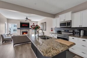 Private kitchen - Relax in Cranston: Spacious 3-Bedroom Calgary Home (Calgary)