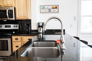 Private kitchen - Egret Escape at Del Mar - Charming Condo w/ Heated Pool, Beach Equipment, & Steps To The Beach (Indian Rocks Beach)