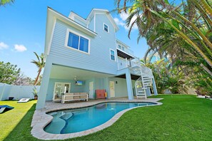 A heated pool - On Ocean Time: 5 Houses to Gulf, Pool by Anna Maria Life Vacation Rentals (Holmes Beach)