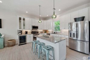 Fridge, microwave, oven, stovetop - On Ocean Time: 5 Houses to Gulf, Pool by Anna Maria Life Vacation Rentals (Holmes Beach)