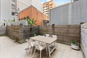 Apartamento | Restaurante al aire libre