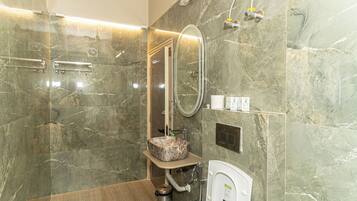 Shower, towels, soap, toilet paper