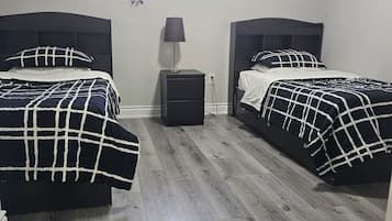 2 bedrooms, desk, iron/ironing board, travel crib